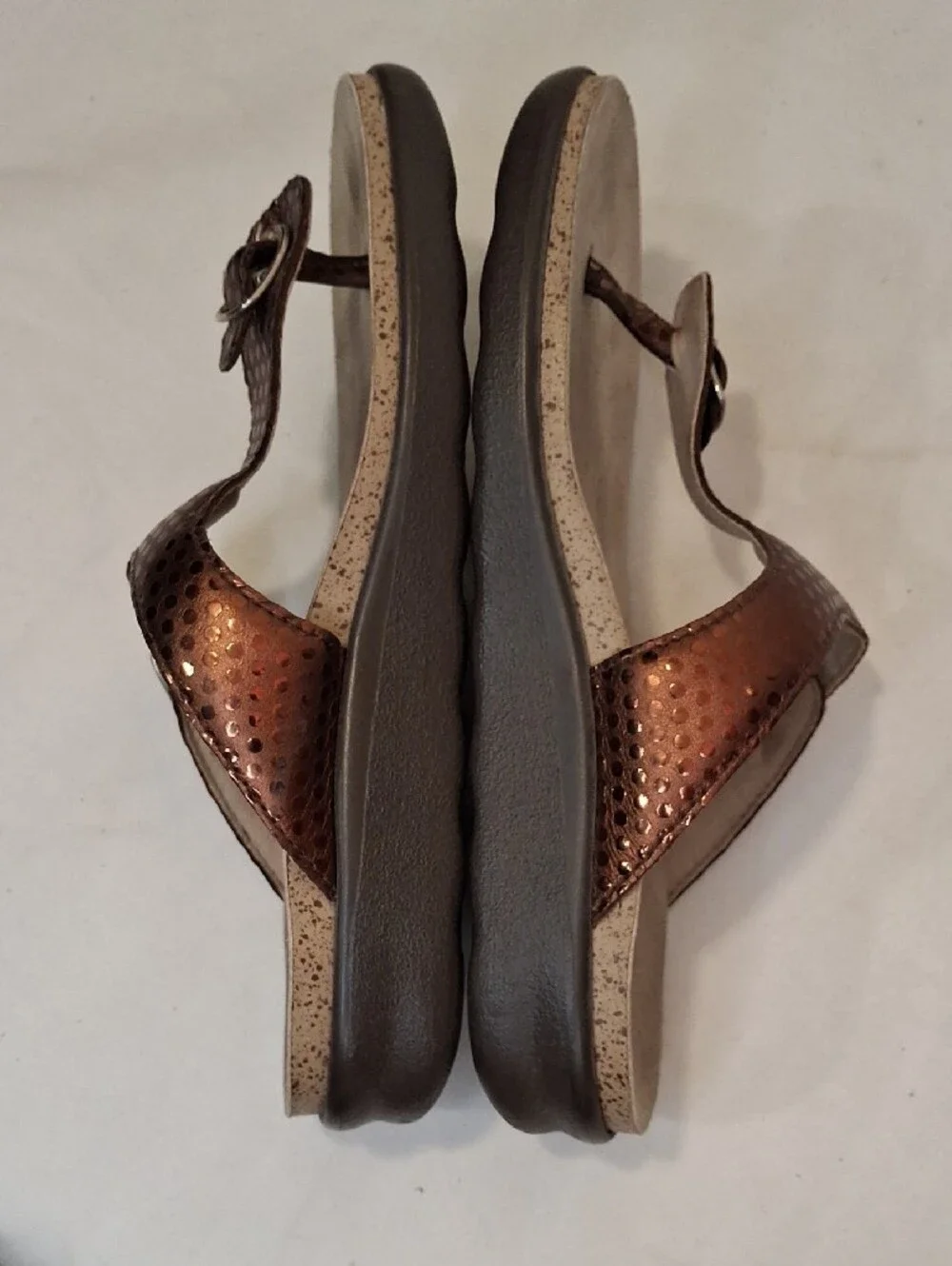 SAS Sanibel Metallic Bronze Gold Thong T Strap Sandals with Gold Buckle Detail.